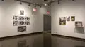 Multiple views of SVA Chelsea Gallery. There are photographs hung on the wall, installations and projections throughout the gallery. 