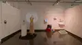 Multiple views of SVA Chelsea Gallery. There are photographs hung on the wall, installations and projections throughout the gallery. 