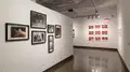 Multiple views of SVA Chelsea Gallery. There are photographs hung on the wall, installations and projections throughout the gallery. 