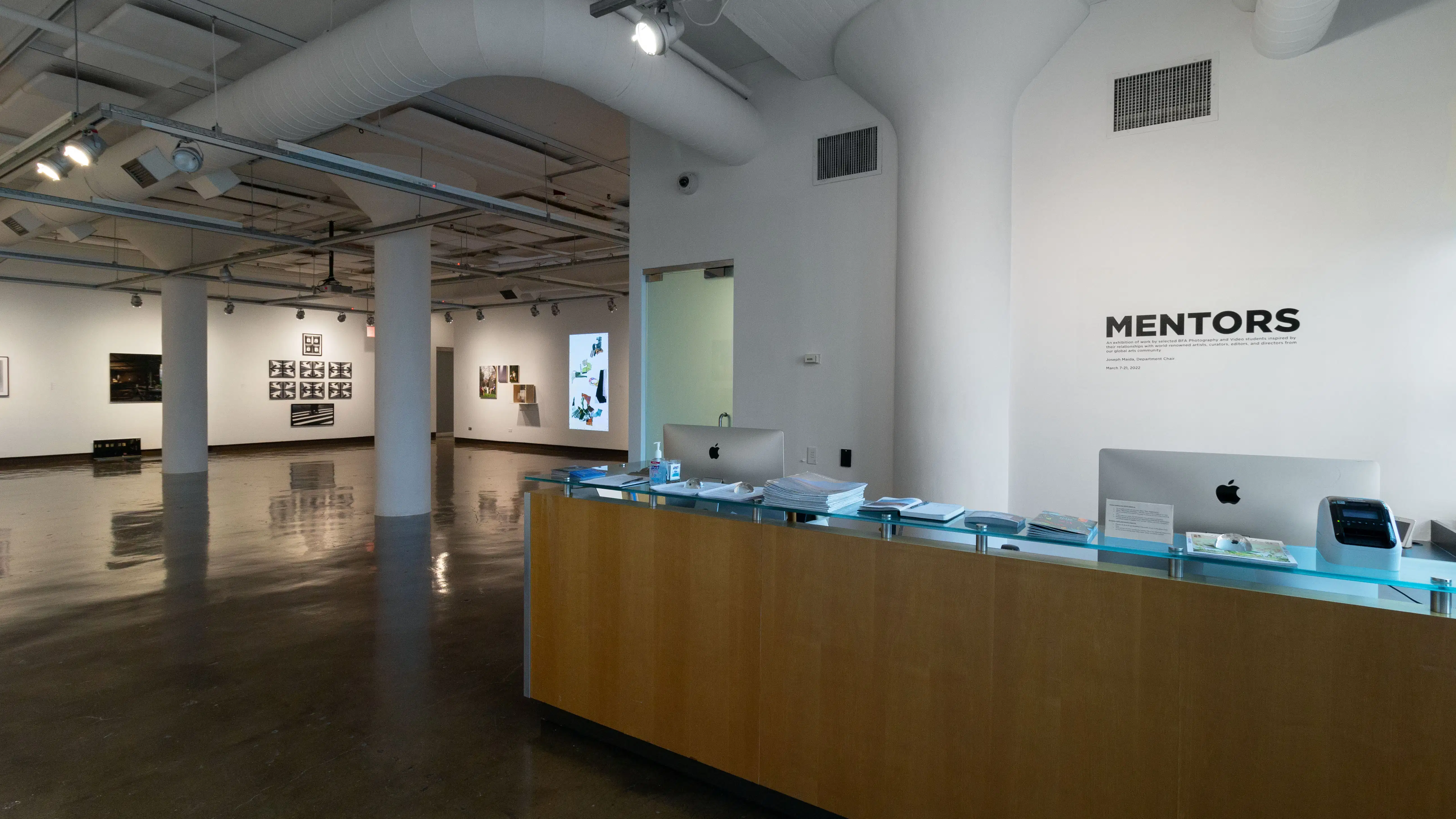 Multiple views of SVA Chelsea Gallery. There are photographs hung on the wall, installations and projections throughout the gallery. 