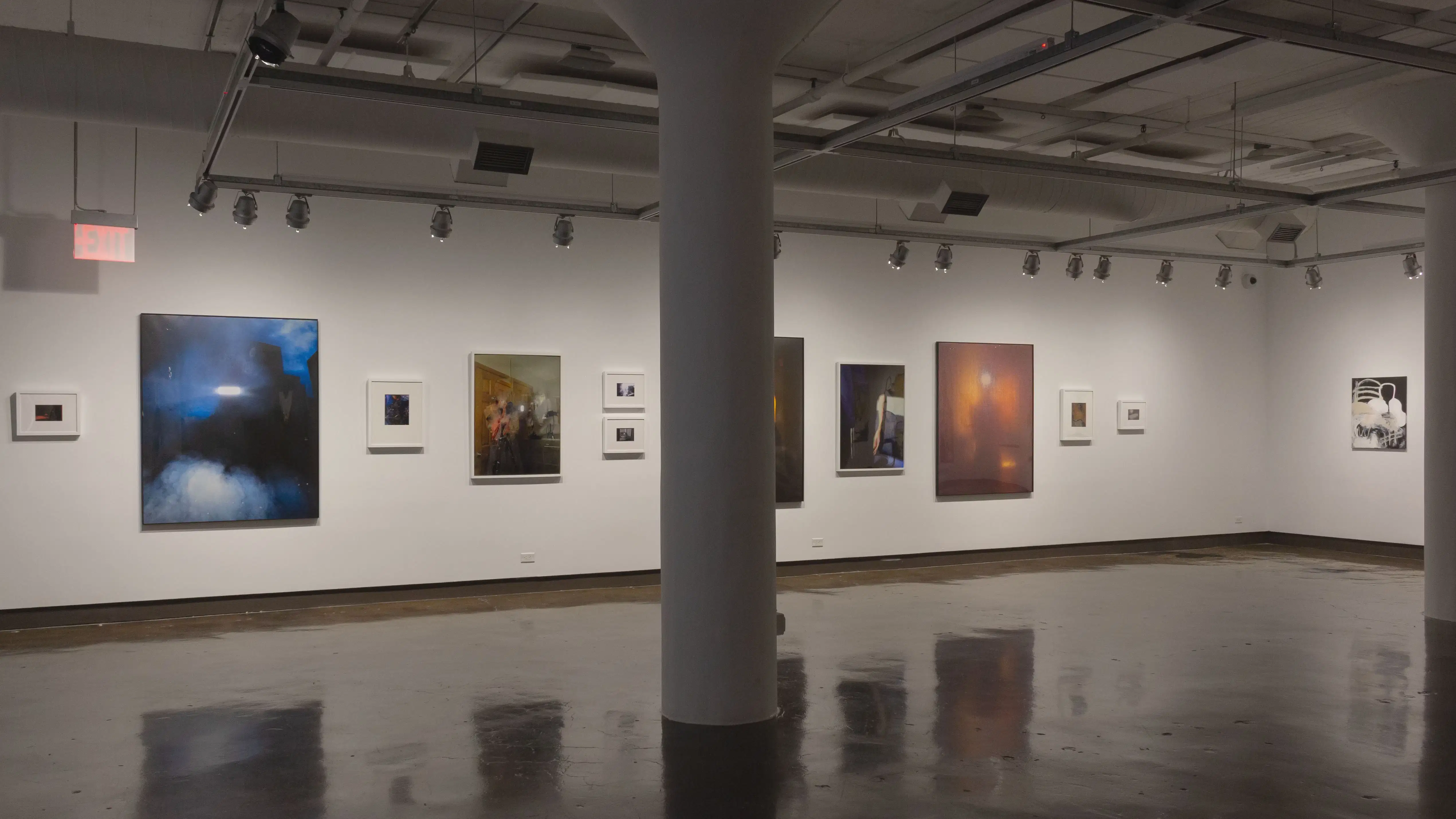 Multiple views of SVA Chelsea Gallery with framed and unframed photographs, video, and installation with projectors. 