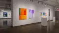 Multiple views of SVA Chelsea Gallery with framed and unframed photographs, video, and installation with projectors. 