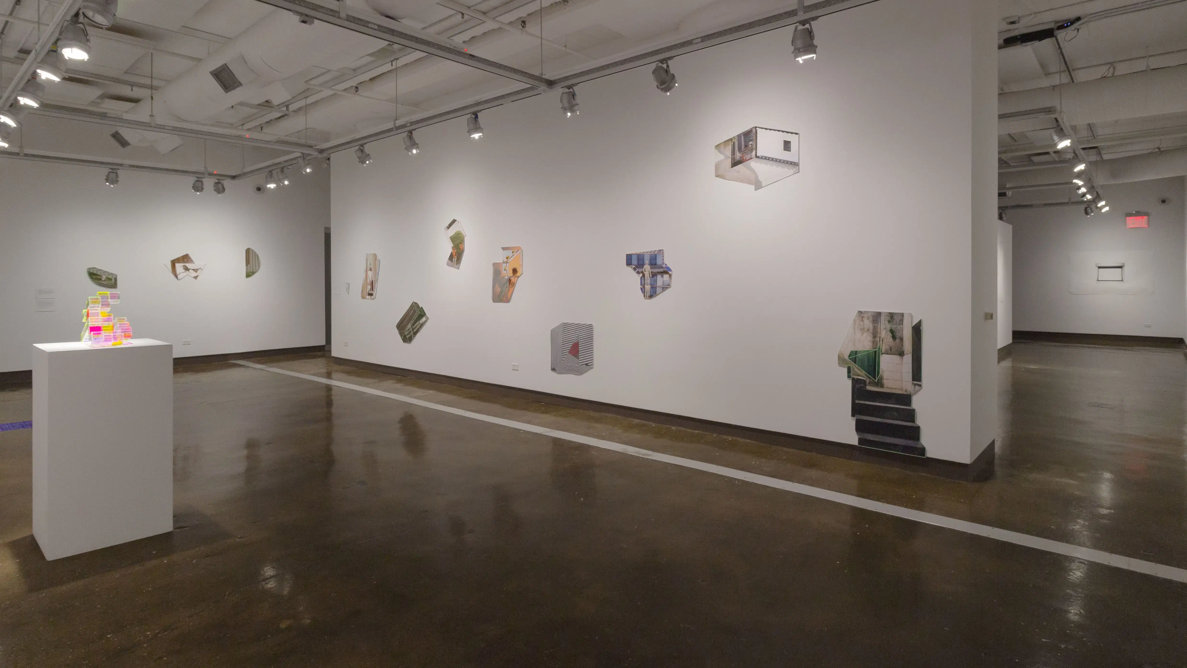 Multiple views of SVA Chelsea Gallery with framed and unframed photographs, video, and installation with projectors. 