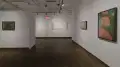 Multiple views of SVA Chelsea Gallery with framed and unframed photographs, video, and installation with projectors. 