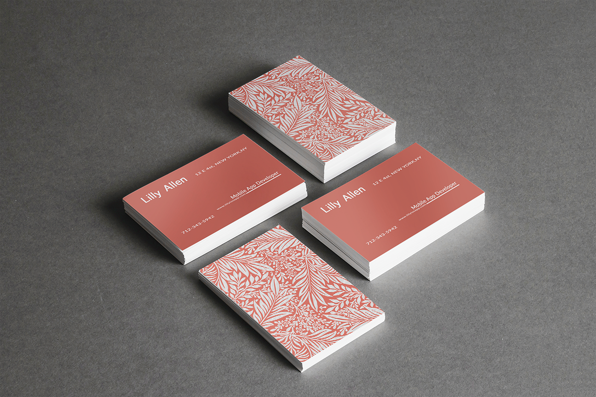 <p "="">A photograph of four stacks of business cards.