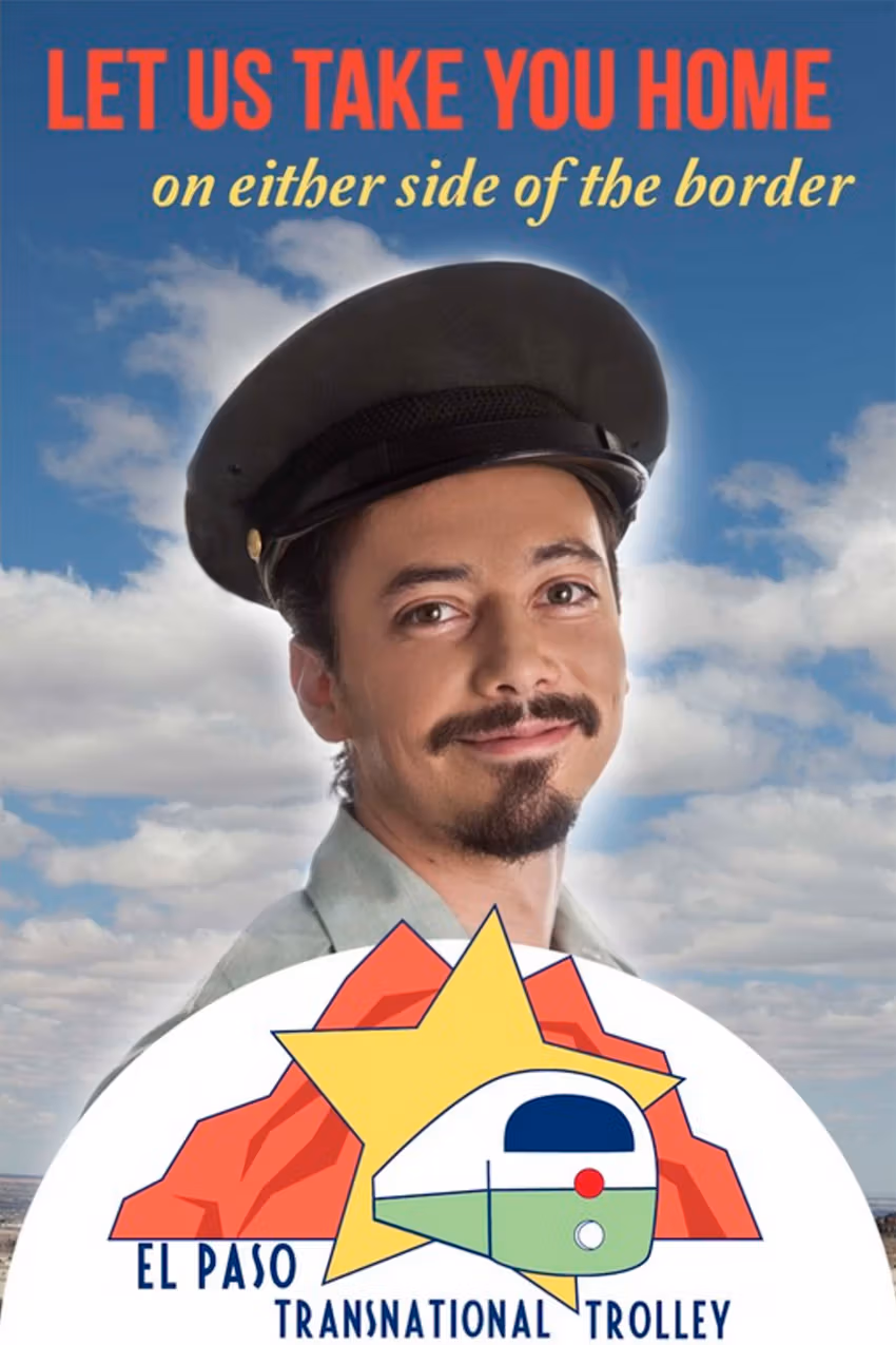A male trolley driver in front of a blue sky.