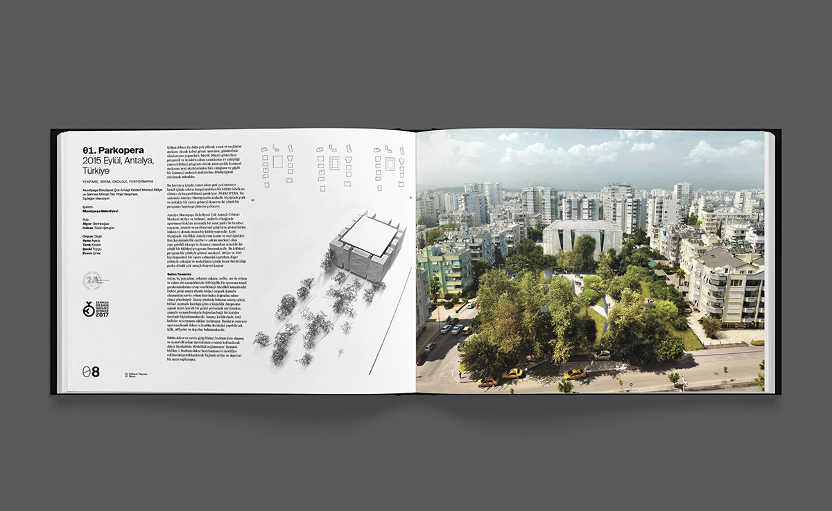 A photograph of a book filled with images of landscapes and buildings.