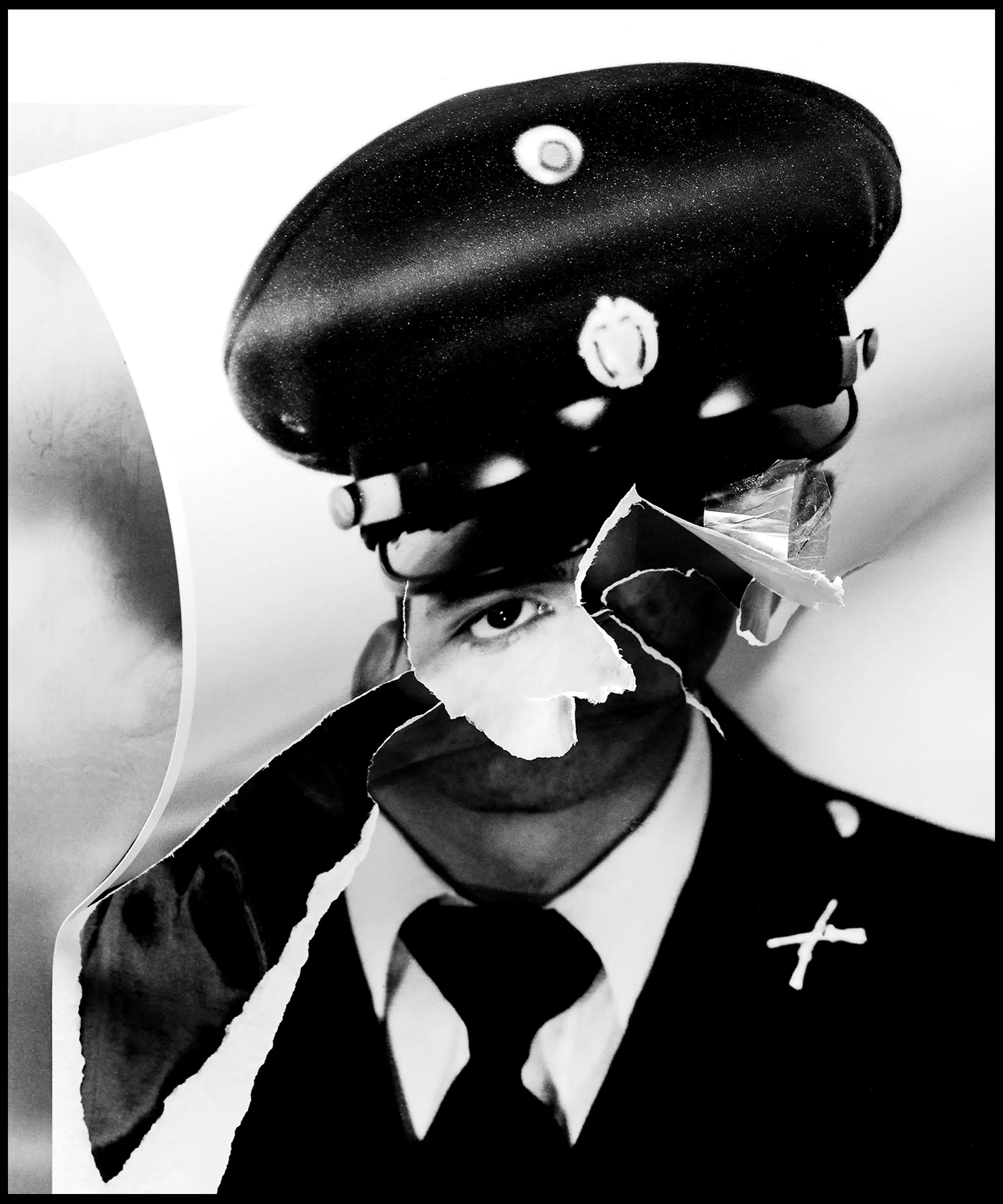 <p "="">A collage featuring a torn and distorted black-and-white headshot of a young man in a military uniform.
