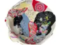 Plaster womb with embroidered and beaded fabric