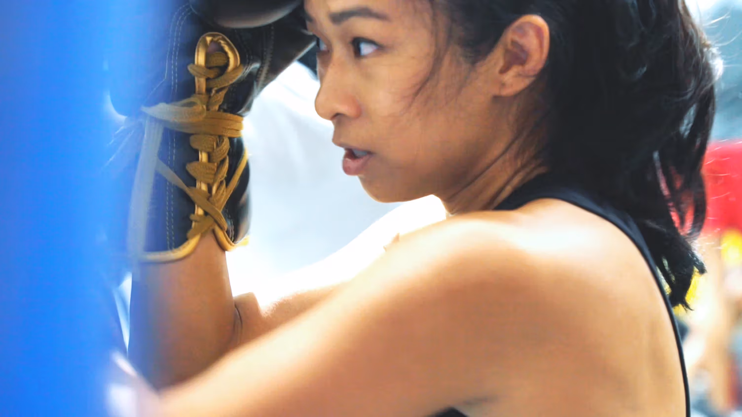 Woman getting ready to fight in the ring 