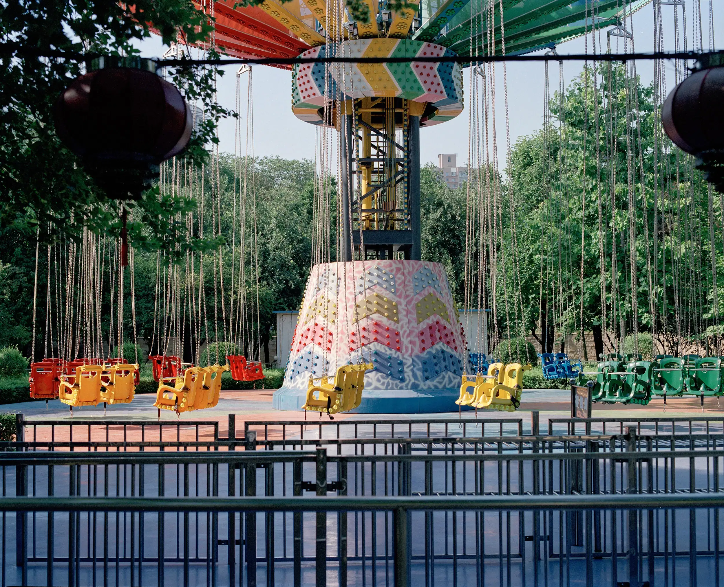 In summer 2022, I revisited the amusement park of my childhood. Many rides were abandoned; others neglected. Drawn to my favorite swing ride, I stood, awash with nostalgia. Though much had changed, echoes of my younger self lingered, anchored in those carefree afternoons.