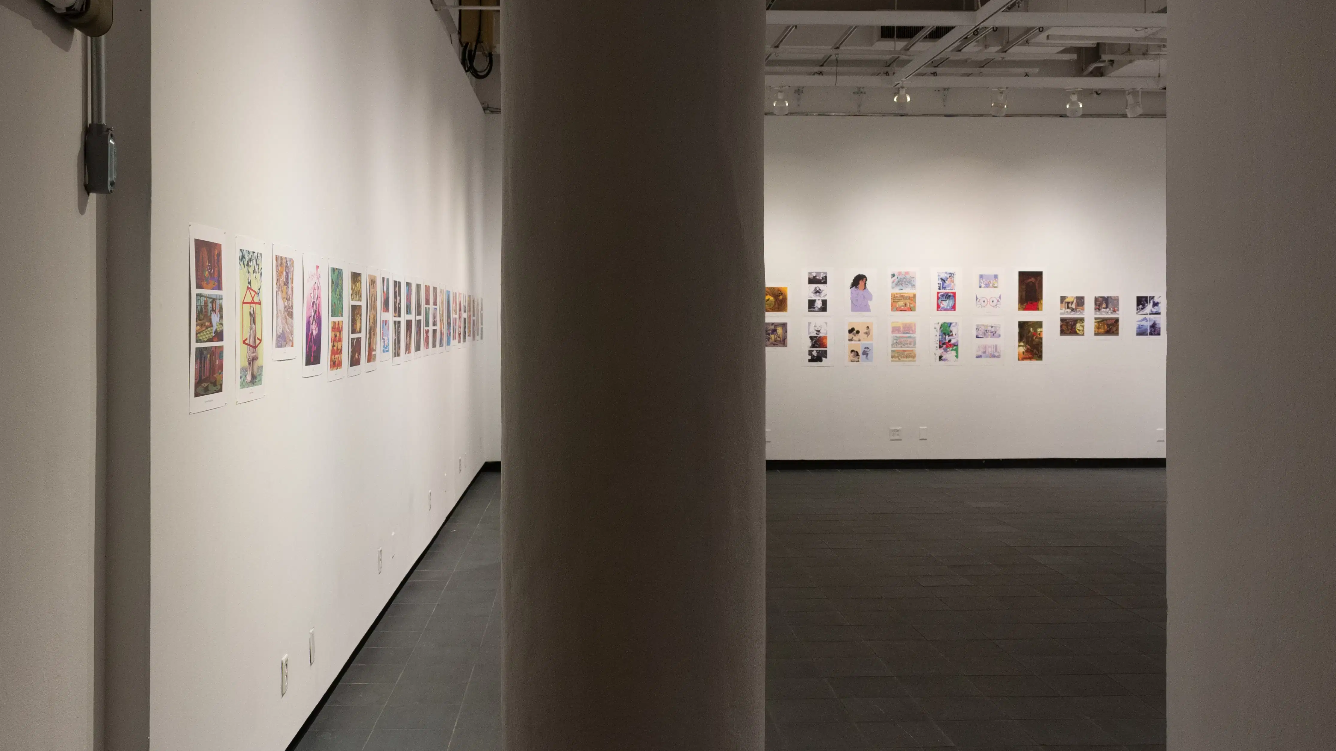 Install image showing a column in the middle of a doorway, with a large gallery in view in the background.