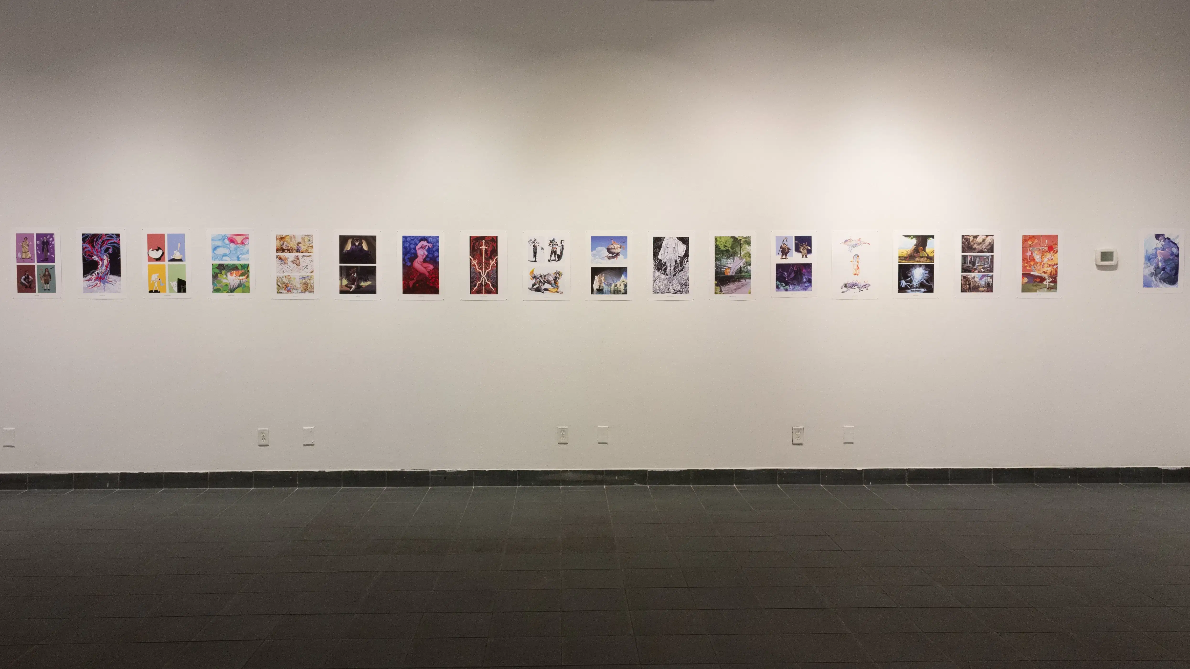 Install image showing a large gallery wall with many prints lining the walls in a row.