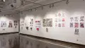 In the second gallery space, many student projects with books, prints, and original works are on view. They differ in style, color, and dimensions.