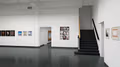 Rendering of an exhibition space with photographs on the walls