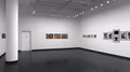 Rendering of an exhibition space with photographs on the walls