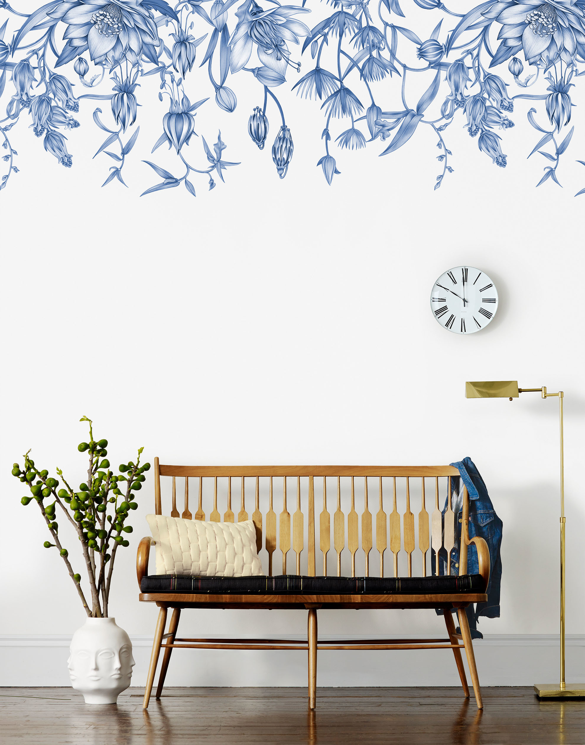A color photograph of wallpaper installed in what appears to be a sitting area in a home.