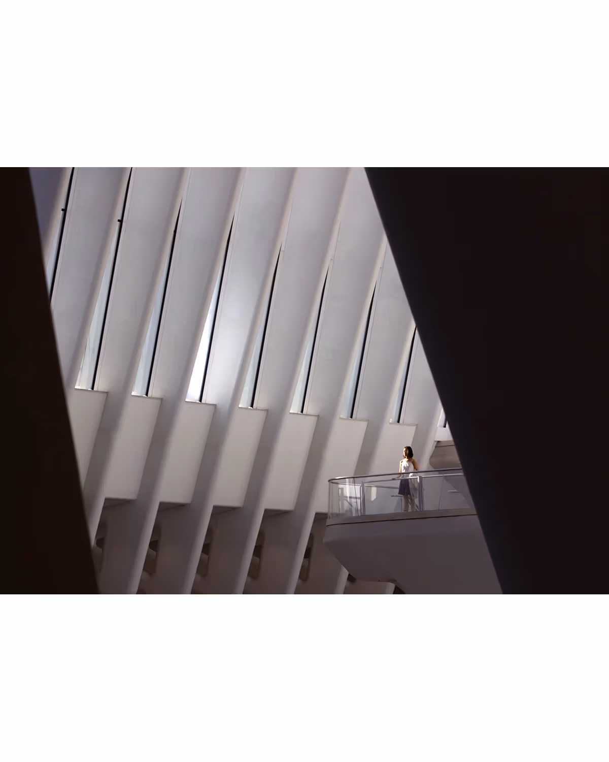 A girl standing alone gazing to the distance