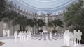 Designed atrium-like space with prominent vertical elements across the covered walls and trees planted throughout space. Several white-colored semitransparent figures congregate throughout the area.