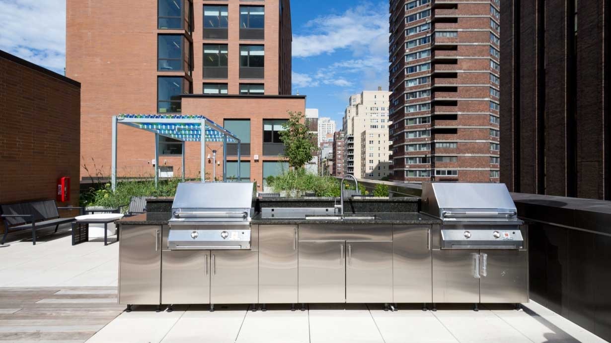 The rooftop deck and grill, with the city in the background