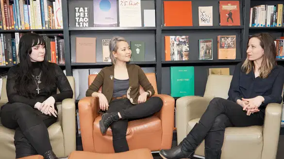 Students and teacher talking in the VCS Lounge.