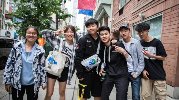 Group of students posing in front of the SVA main building.