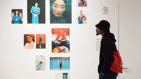 Guest viewing work at MPS Fashion Photography thesis show.