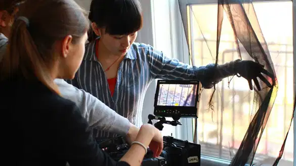 MPS Film Directing students shooting on set.