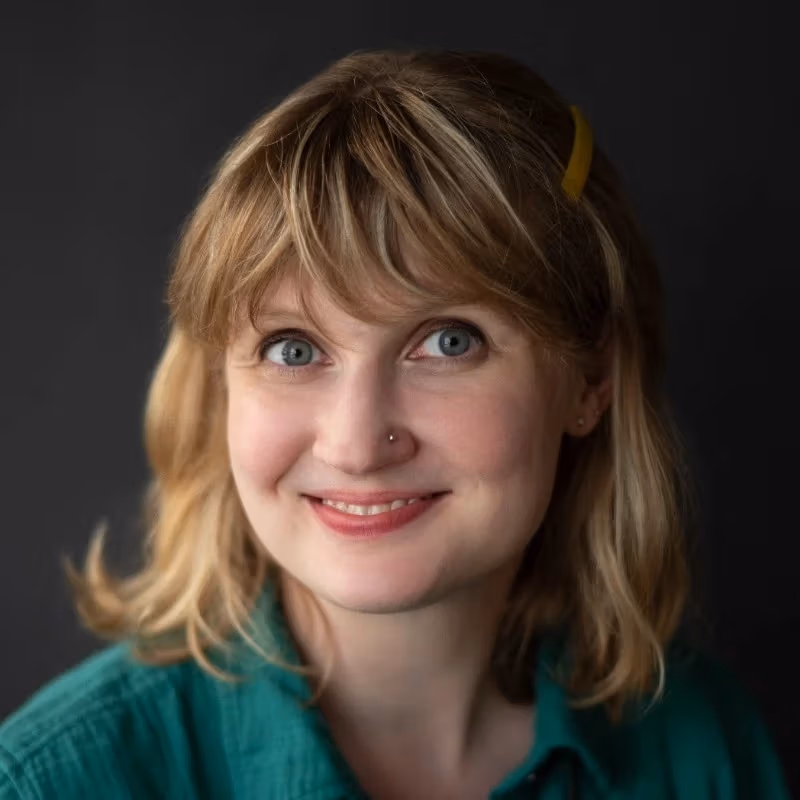 photo with green shirt and gray background