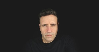 Faculty member Charles Nix wearing a black shirt.