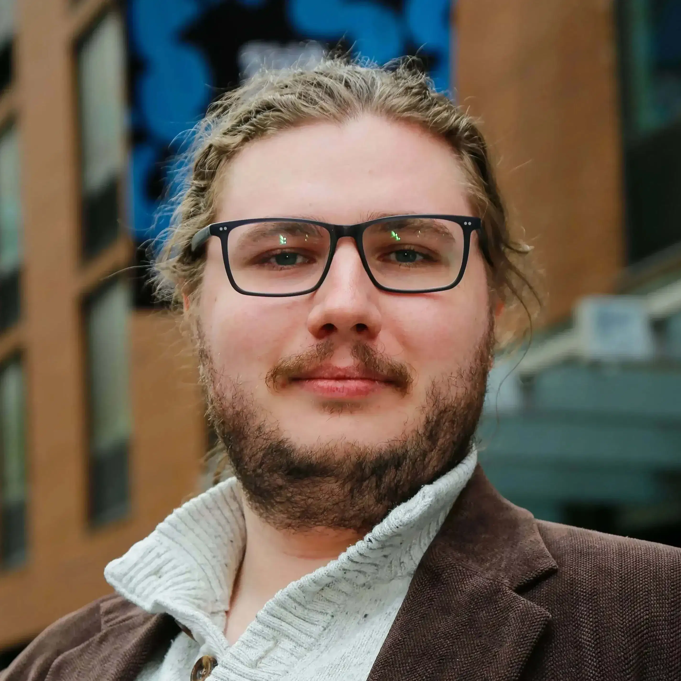 A portrait of Admissions Coordinator Jacob Prescott.