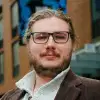 A portrait of Admissions Coordinator Jacob Prescott.