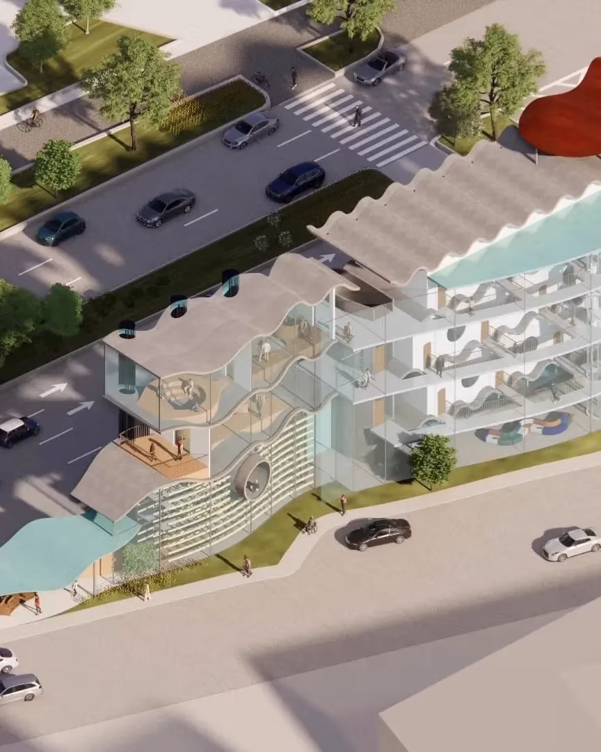 A bird's eye view of a modern housing facility and building complex in Manhattan near the river.