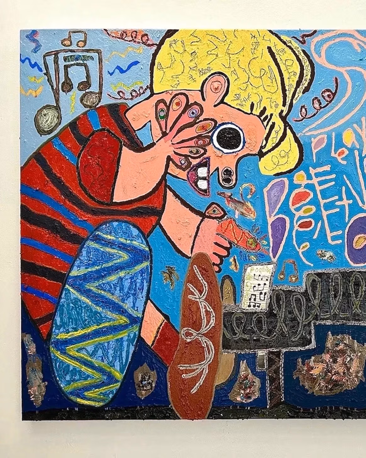Colorful abstract painting depicting a child with exaggerated eyes in a red-striped shirt, playing a piano. A cartoonish, wide-eyed creature sits beside, surrounded by whimsical patterns and musical notes. Blue background with vibrant, dynamic energy.