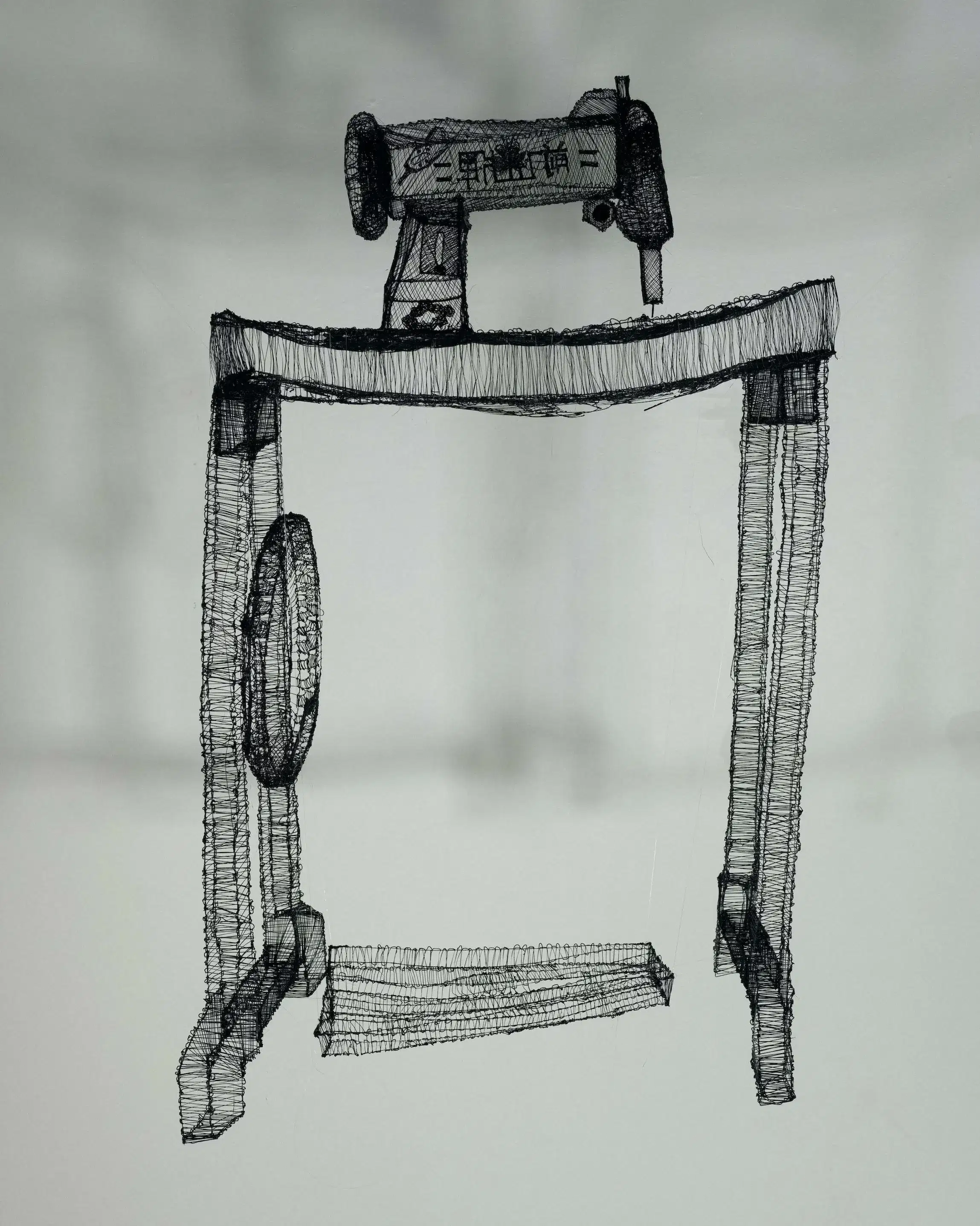 A 3D-printed blacks sewing machine station
