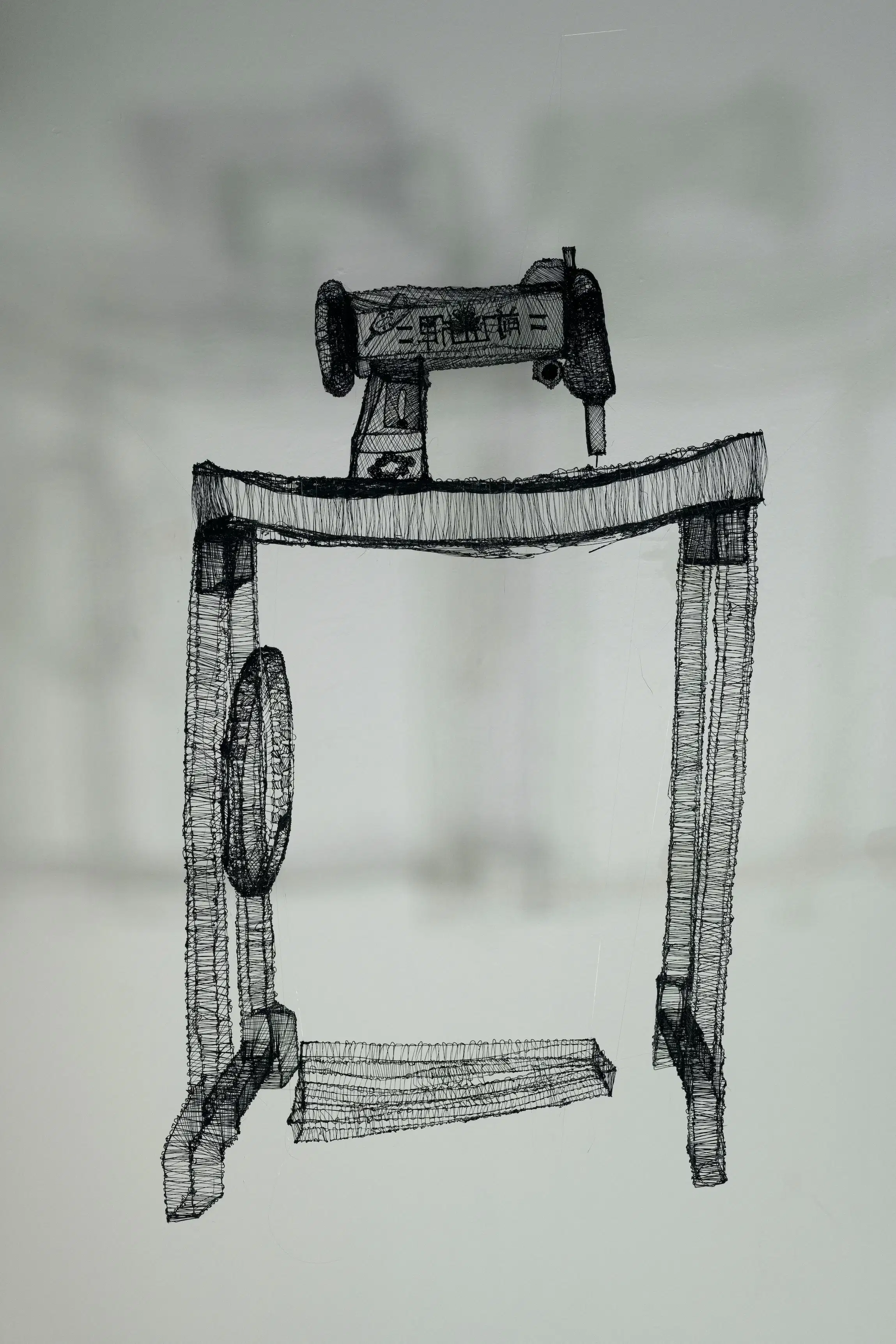 A 3D-printed blacks sewing machine station
