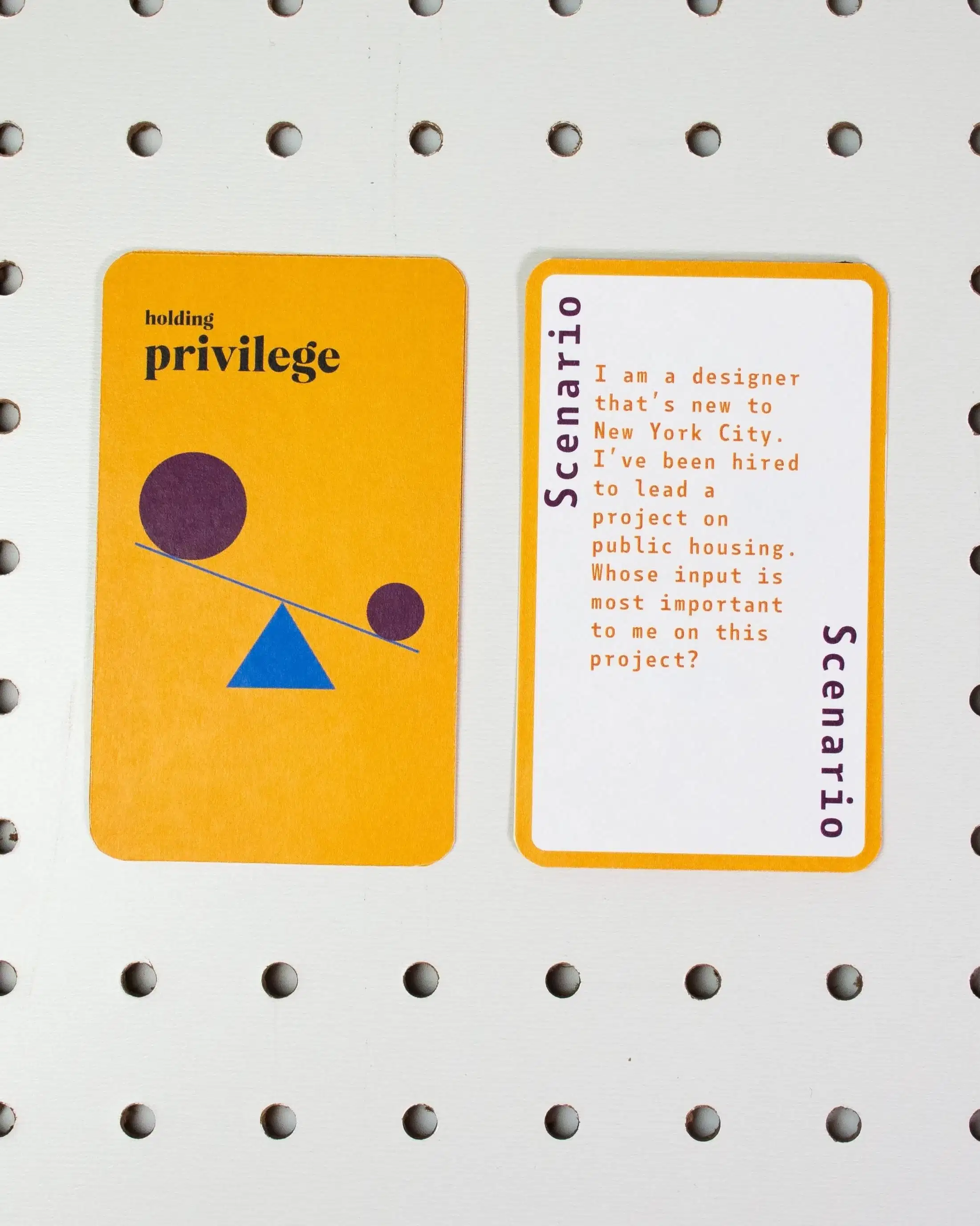Prototype for a card game with five cards on display: 1.) Front: a random scenario Back: "Holding privilege" with a tipped scale. Four factoid cards display info on generational wealth, Latinx, Native/Indigenous and marriage