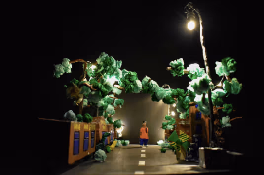 A digital rendering of a canopy of trees with a child standing beneath by Roshan Ganu