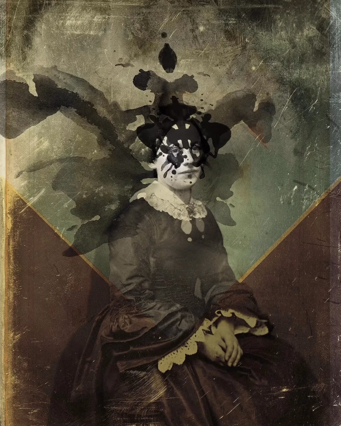 A photograph of a little girl in a Victorian dress with what resembles a Rorschach ink blot on her face and behind her, almost like wings.