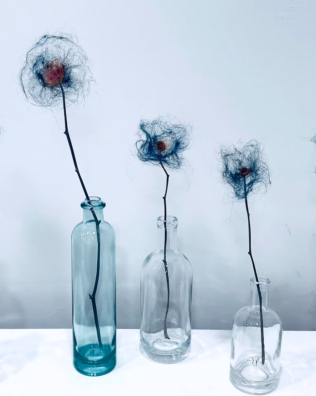 Jay Jansen, WHY BLUE?, 2023, Artist’s Hair, Hair Dye, Wood, Glass, 20” x 18” x 6”