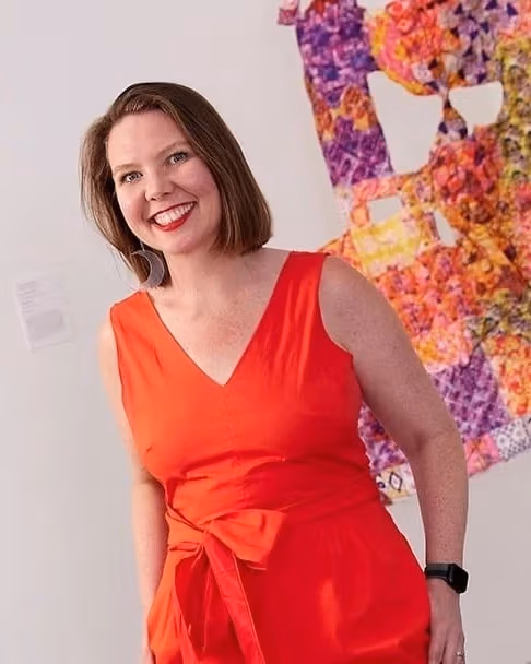 Photo of woman in red jumpsuit