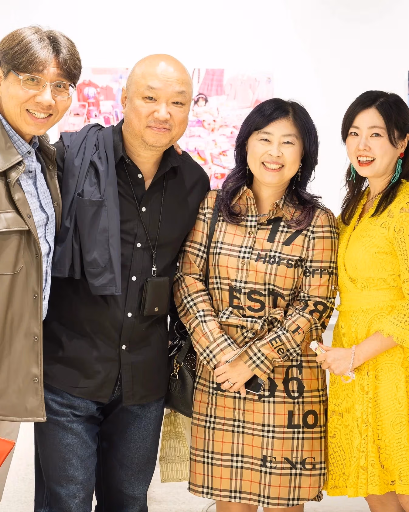 A group of people pose for a photo in SVA's Andrew Chang Gallery in Seoul.