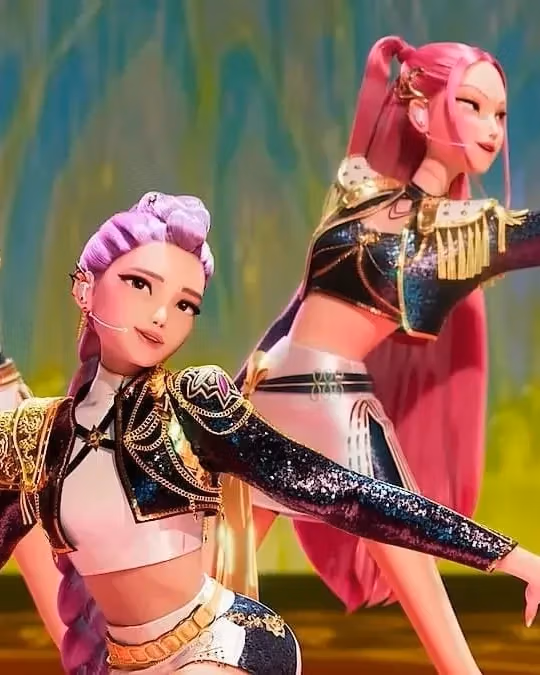 Three animated characters with colorful hairstyles perform a dynamic dance on stage, wearing glittery outfits, exuding energy and confidence.