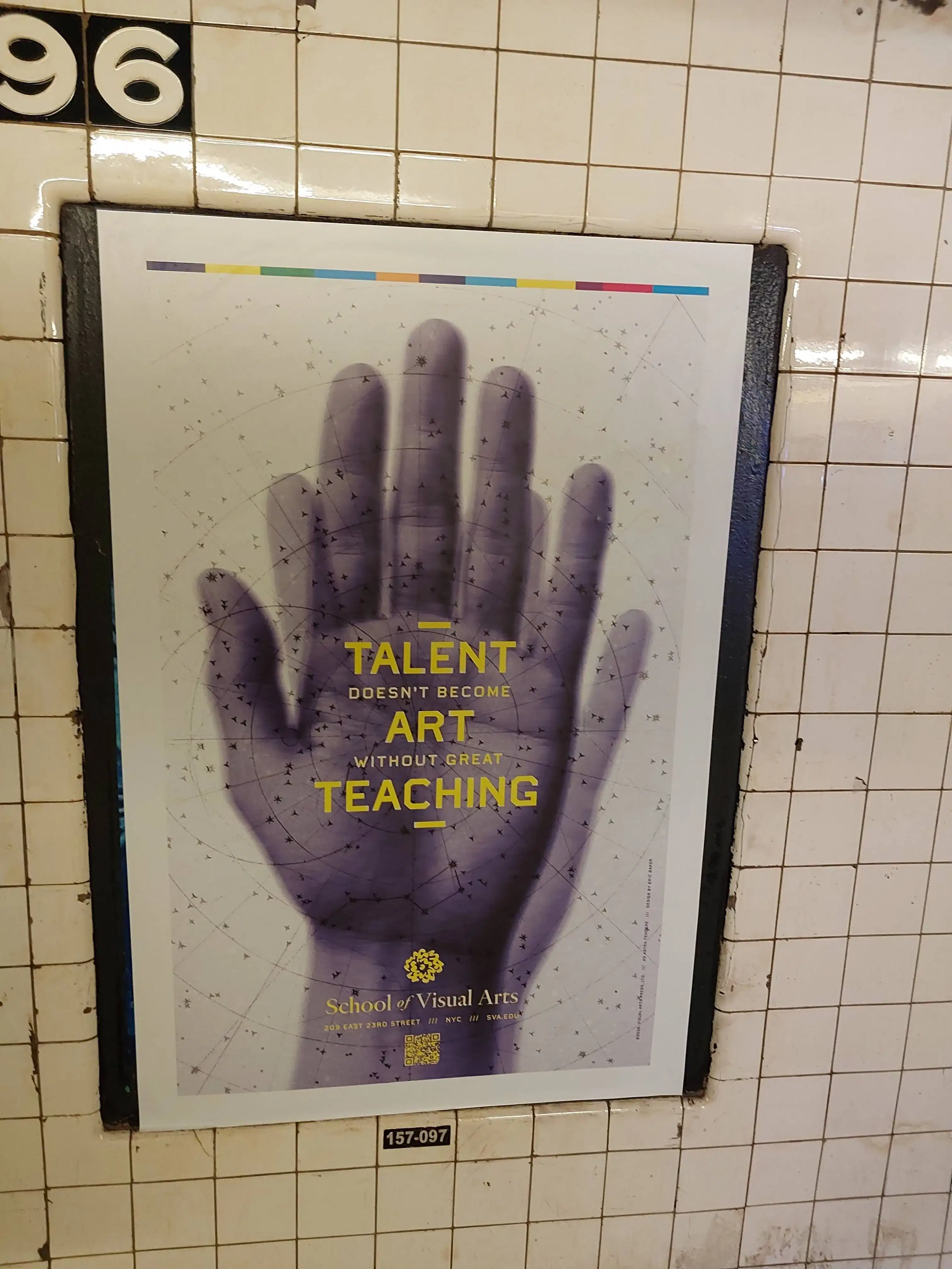 Poster in a tiled subway station shows a large, purple hand with star map design. Text reads "Talent doesn't become art without great teaching." School of Visual Arts logo below.