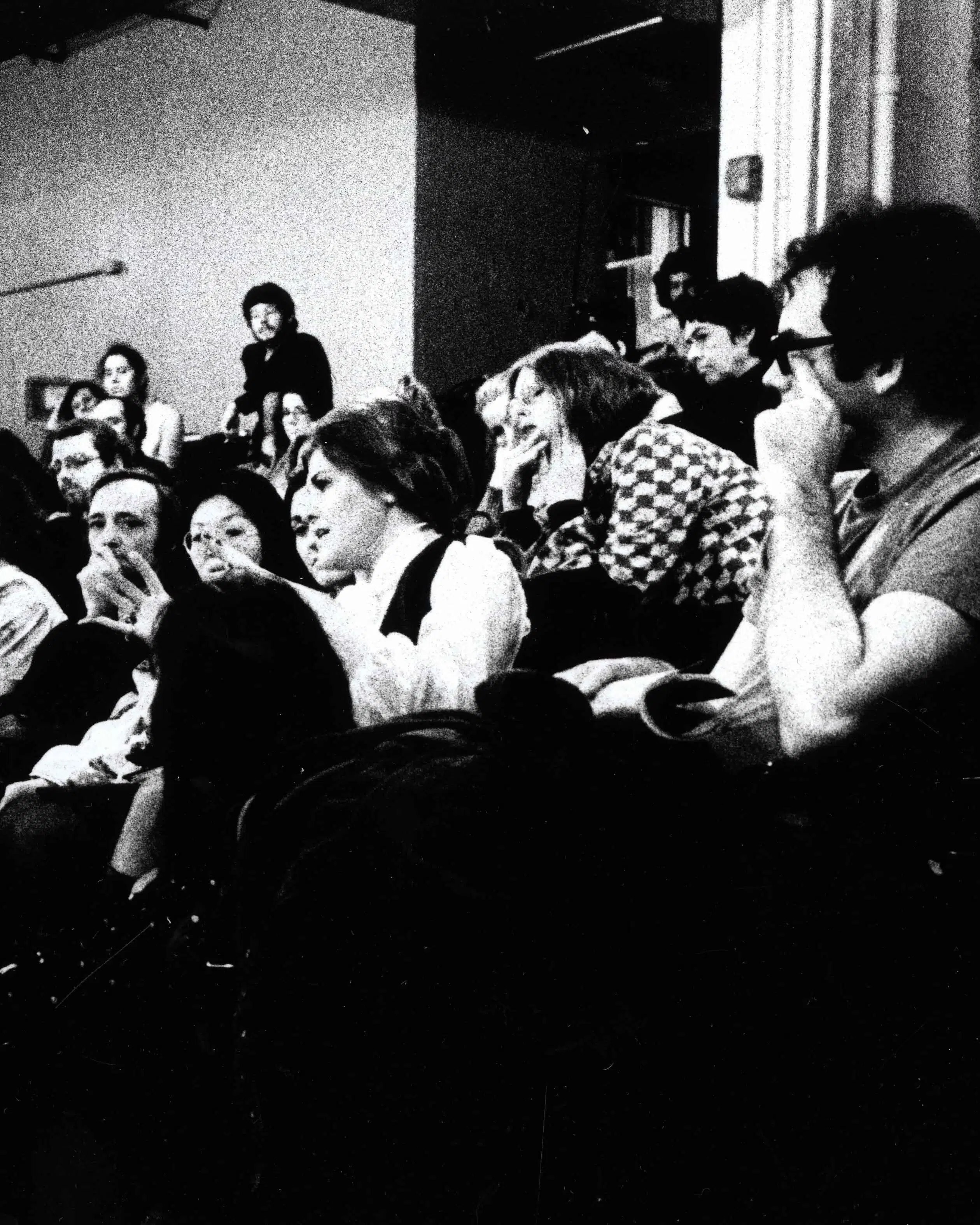 black and white photo of students in auditorium
