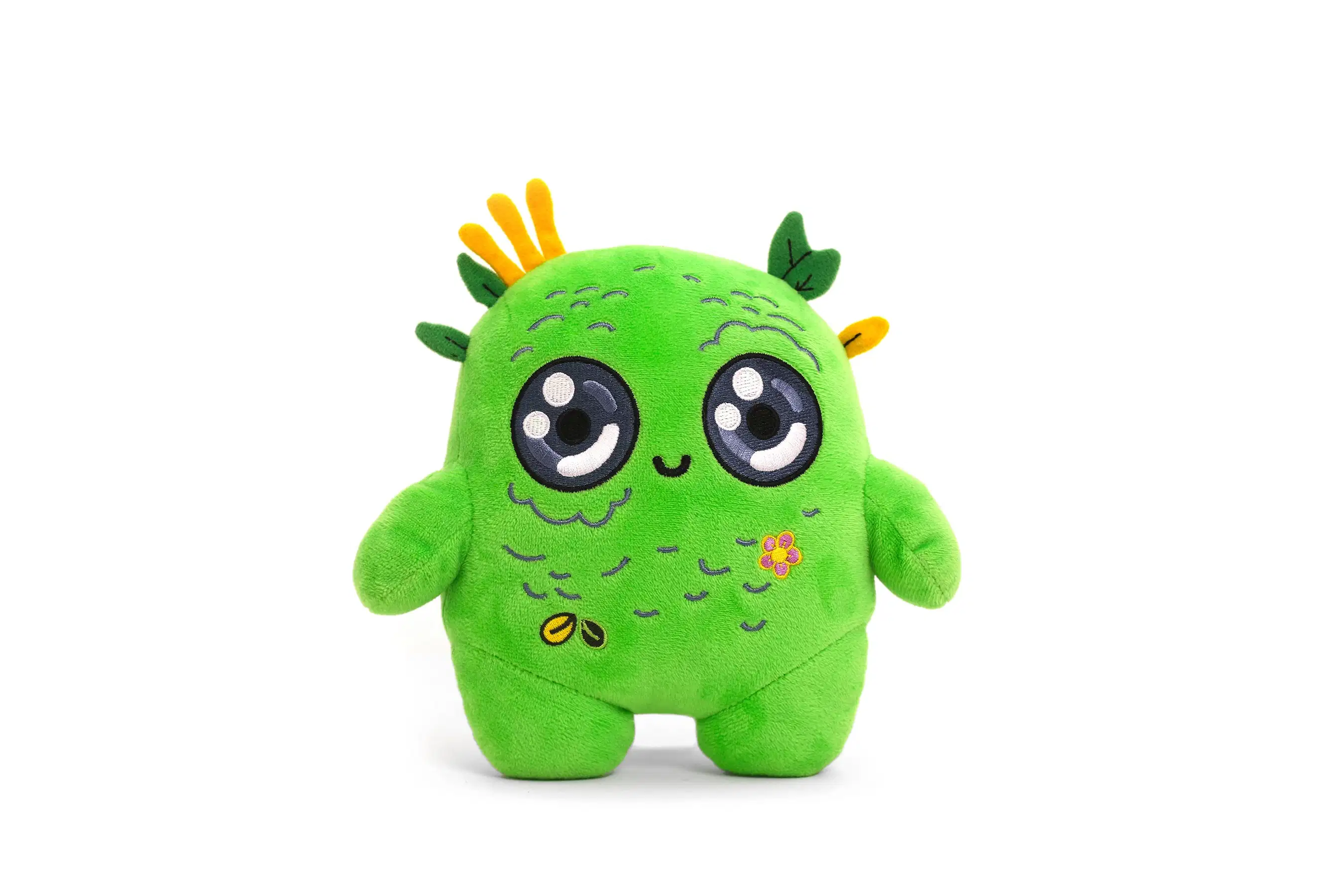 A photograph of an alien-looking green stuffed animal.