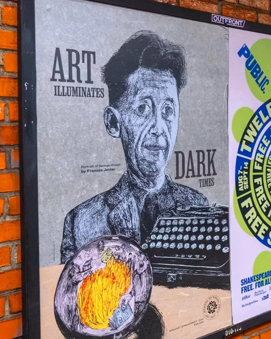 A man strolls past a brick wall adorned with vibrant posters.