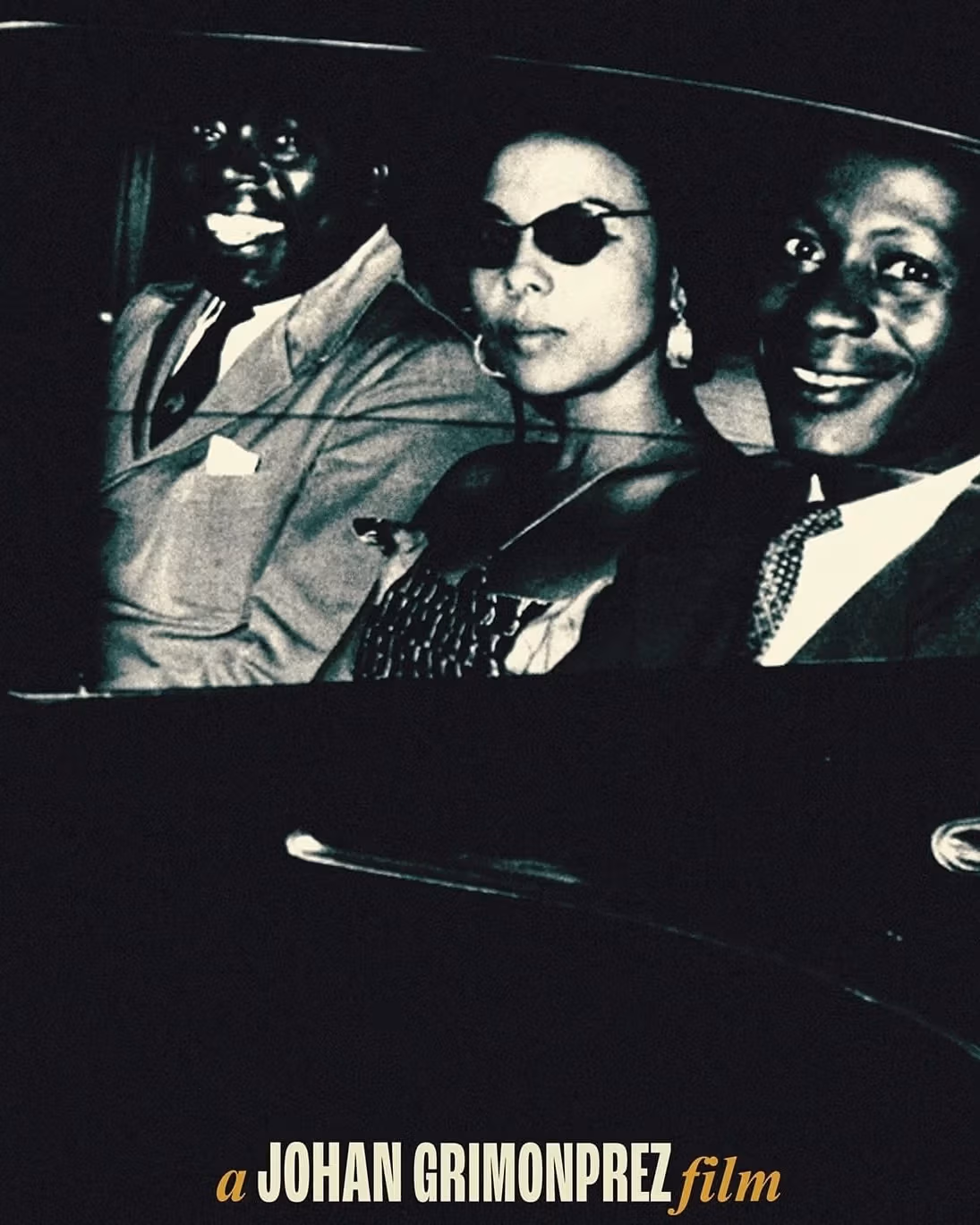 Three people sitting in car with text "A Johan Grimonprez film"