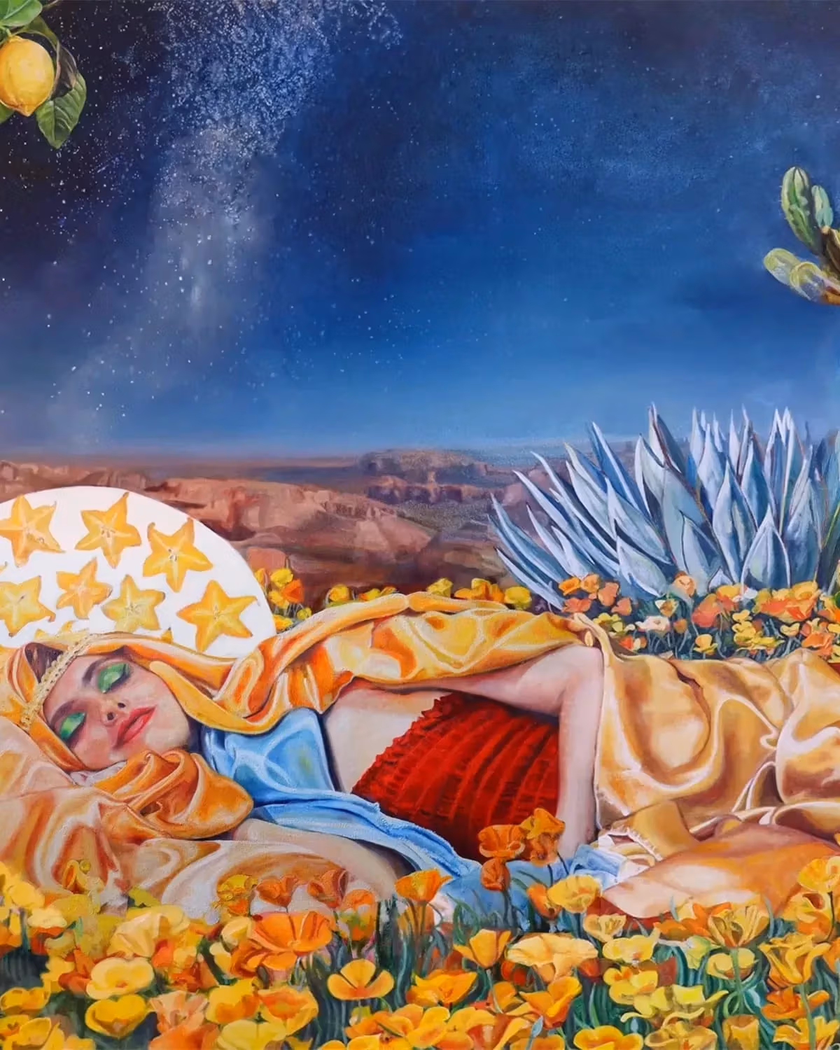 A woman with a yellow silk headdress, a red dress, green eyeshadow, and tattoos of trees lies in a field of flowers with cacti and a desert behind her. The night sky is starry and behind her is a circle adorned with what looks like cross sections of starfruits.